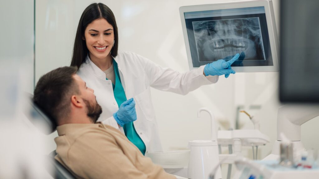 Dentiste au Portugal pratiquant des soins dentaires
