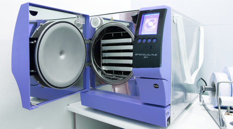 Sterilization equipment and surgical preparation room showing infection control protocols, documented sterilization processes, and professional clinical environment standards
