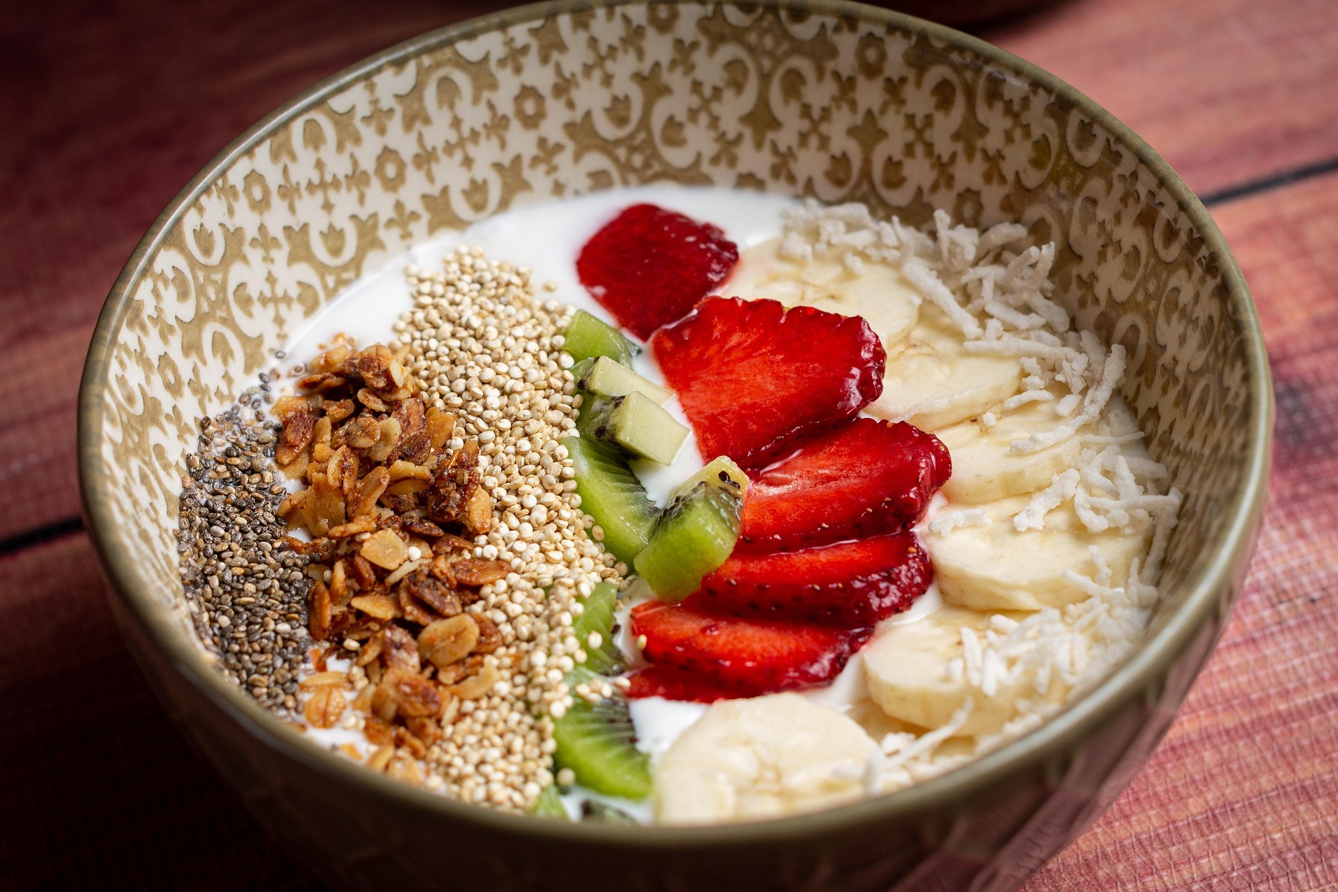 Yogurt bowl with soft fruit, a safe food to eat after dental implant surgery in Porto